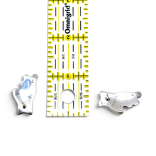 925Collection abstract sterling silver stud earrings with post-back closure shown next to a ruler for scale