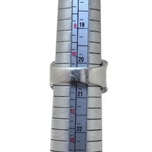 925Collection JAI sterling silver wide band ring with intricate woven texture on a metal ring sizing mandrel