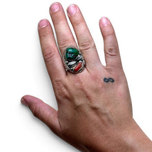 925Collection sterling silver Southwestern statement ring with turquoise and red coral on a hand