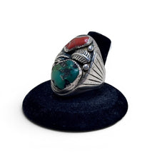 925Collection Southwestern sterling silver statement ring with turquoise and red coral stones and leaf engravings.