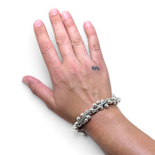 925Collection multi-strand sterling silver bead bracelet worn on a wrist, featuring polished silver spheres.