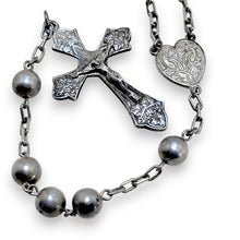 925Collection sterling silver rosary necklace featuring polished spherical beads, a heart centerpiece, and ornate crucifix