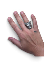 925Collection sterling silver bull head statement ring worn on a finger with detailed sculptural features