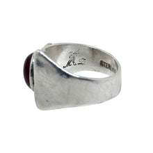 925Collection vintage sterling silver ring featuring an asymmetrical design and a deep red carnelian stone.