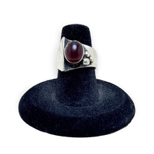 925Collection vintage sterling silver ring featuring an asymmetrical design and a round red carnelian gemstone.