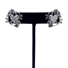 925Collection sterling silver heart stud earrings with intricate filigree and floral detailing on a black display stand