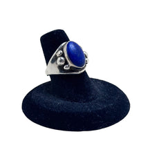 925Collection sterling silver ring with an oval lapis lazuli stone and decorative bead accents on a black display
