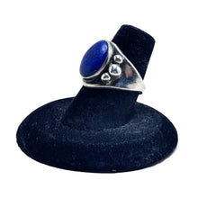 925Collection sterling silver ring featuring a deep blue oval lapis lazuli stone with decorative silver bead accents.