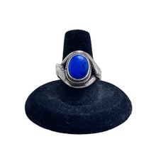 925Collection sterling silver statement ring featuring an oval-cut blue lapis lazuli stone with a textured snake motif.
