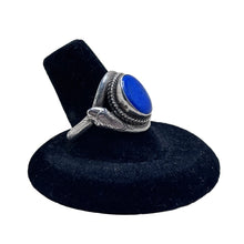 925Collection sterling silver statement ring featuring an oval lapis lazuli gemstone and an intricate snake motif band.