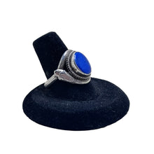 925Collection sterling silver statement ring featuring an oval lapis lazuli gemstone with an intricate snake motif.