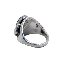 925Collection sterling silver ring featuring a deep blue oval lapis lazuli stone with decorative silver bead accents.