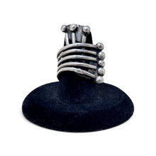 925Collection artisan sterling silver multi-band statement ring with rounded bead detailing on a black display stand.