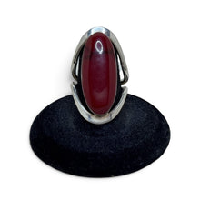 925Collection sterling silver statement ring featuring a deep red oval cabochon stone and an open-work band design.
