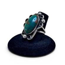 925Collection sterling silver statement ring featuring an oval green turquoise stone with intricate scrollwork details