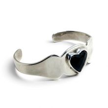 925Collection vintage Taxco sterling silver cuff bracelet featuring a domed black enamel heart in a bezel setting.